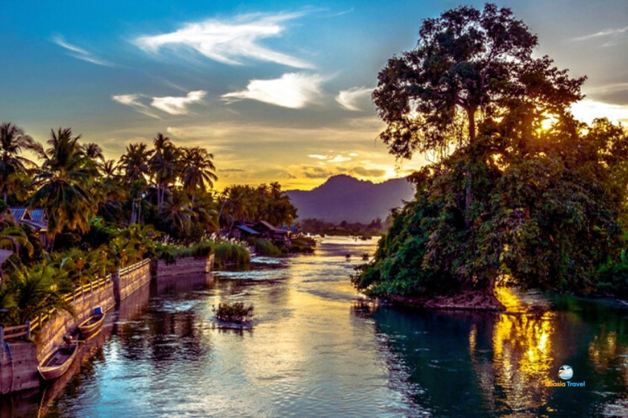 Sunset over tropical river at Laos 4000 Islands – Auasia Travel